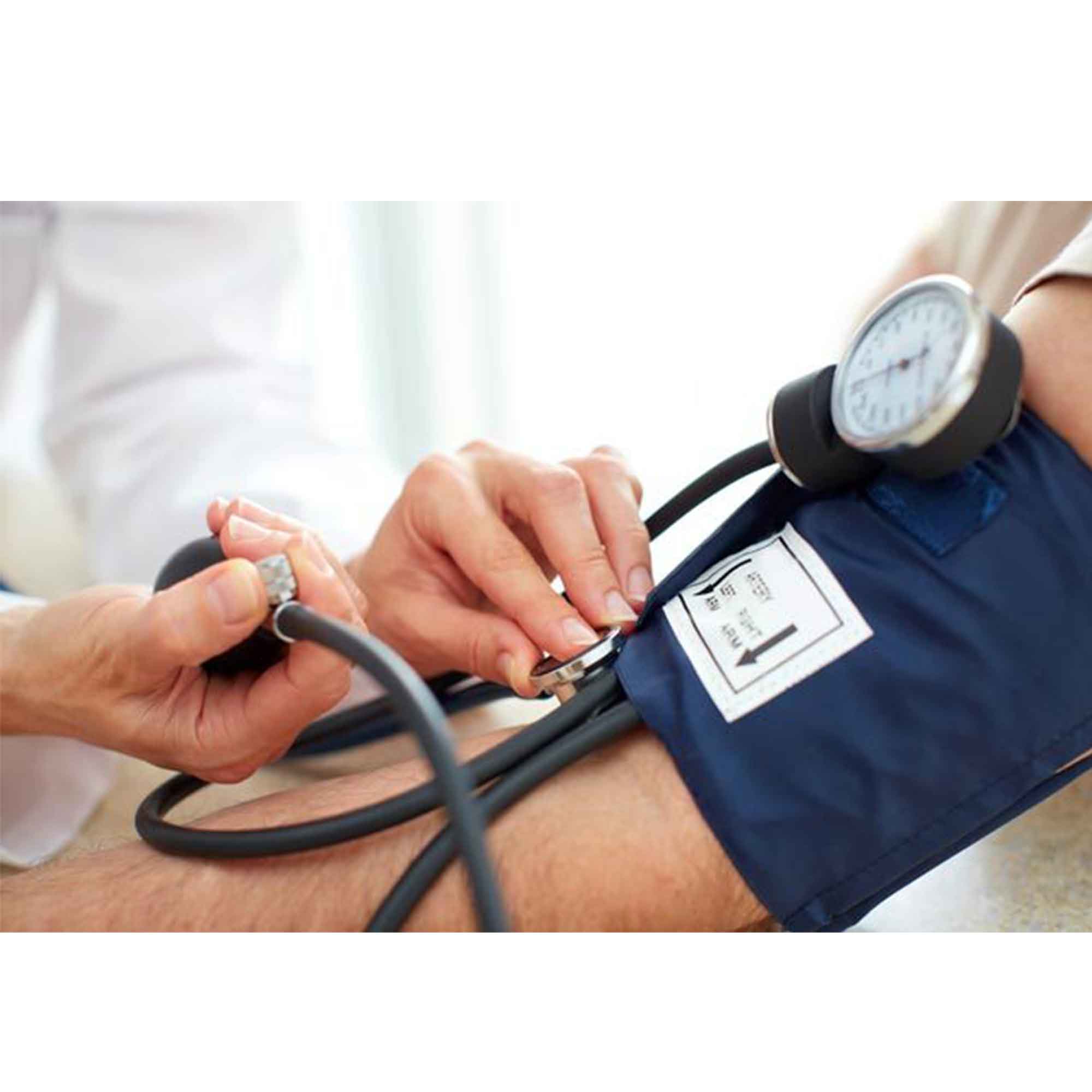 Clinician checking blood pressure with an arm cuff and stethoscope